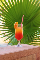 Cocktail on the sea background. Selective focus.
