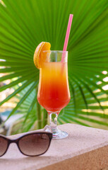 Cocktail on the sea background. Selective focus.