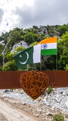 Flags of Pakistan and India, heart sculpture