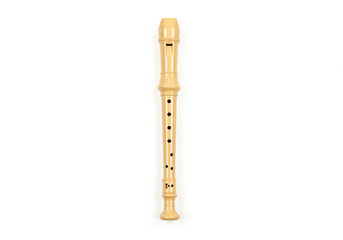A classic beige soprano recorder, a popular woodwind instrument for music education, isolated on a clean white background