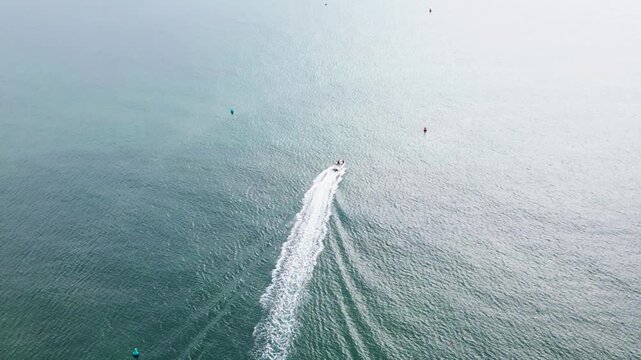 Aerial shot of boat leaving Christchurch Bay 