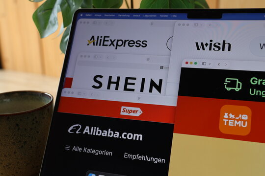 Kiel, Germany - 09-02-2025: AliExpress, Shein, Wish, and Temu logos on laptop screen
