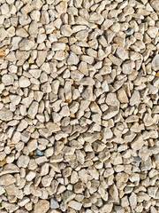 Natural gray gravel texture showing small stones suitable for landscaping projects or decorative applications