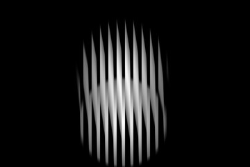 Abstract vertical streaks of light create a mesmerizing oval pattern on a black background