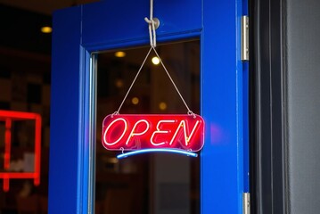 Open Sign on cafe or restaurant hang on door at entrance