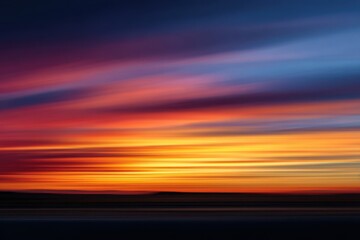 Obraz premium Blurred background of a sunset sky