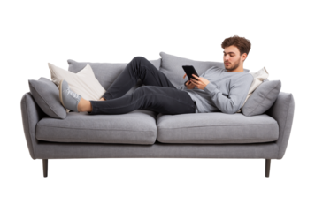 Young Man Relaxing on Sofa with Tablet: Leisure and Digital Comfort at Home isolated on a transparent background