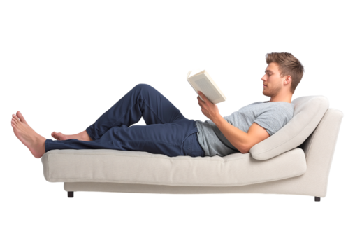 Relaxed Young Man Reading Book on Sofa isolated on a transparent background