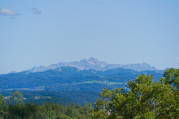 Obraz premium Scenic view of Glatt valley with Alpstein mountains in the background seen from Swiss city of Zürich on a sunny summer day. Photo taken August 31st, 2025, Zurich Schwamendingen, Switzerland.
