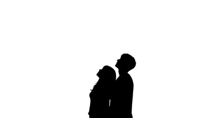 Silhouettes of a couple looking upwards against a bright white sky symbolizing hope and dreams