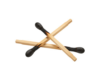 Isolated pair of burnt matches with fire damage on wooden stems for safety lighting