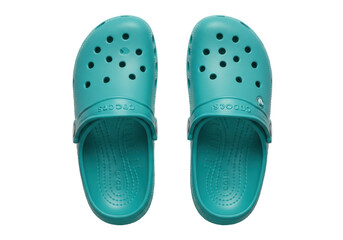 Isolated pair of teal Crocs clogs, comfortable shoes made of foam resin material