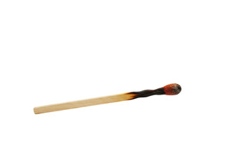 Isolated burnt matchstick on table, tool for starting a fire and creating light, detail