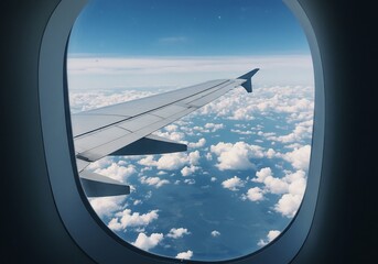 Fototapeta premium 機内からの白い雲と青い空の景色