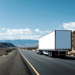 Semi-truck drives on highway with mountain backdrop; rear angle, clear sky, daytime; transport industry, logistics, Nevada
