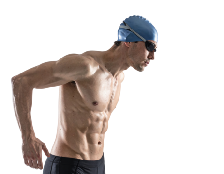 A muscular swimmer prepares to dive, showcasing athleticism and focus with a swim cap and goggles.