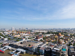 Pagoda at Wat Arun buddhist Temple of dawn a tourist landmark with Chao Phra Ya river aerial view