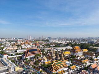 Pagoda at Wat Arun buddhist Temple of dawn a tourist landmark with Chao Phra Ya river aerial view