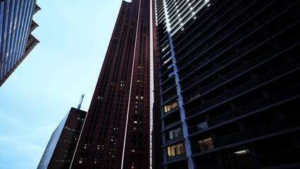 Two awe-inspiring skyscrapers stand side by side, creating a captivating symphony of architecture and urban marvel.