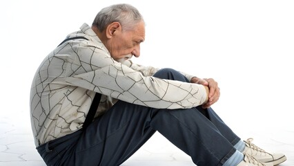 Elderly man struggling with loneliness and despair, a powerful visual mockup for mental health awareness campaigns, depicting a senior citizen in distress, isolated and vulnerable