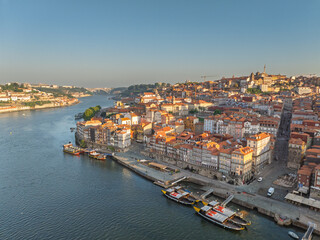 Fototapeta premium Douro river in Porto City, Portugal. Ribeira District Architecture. Drone