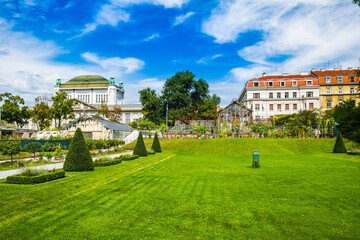 Obraz premium Botanical Garden in Zagreb, Croatia, Historical archive building (old national library) in the background.
