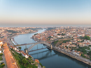 Obraz premium Morning No People Dom Luis Bridge in Porto City, Portogal. Drone. Douro River. Old Town Downtown in Background