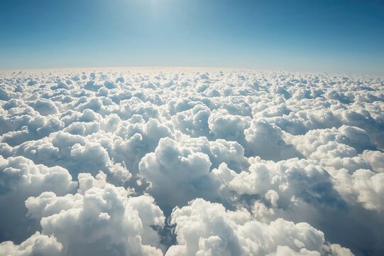 An infinite sky stretches over the clouds, revealing celestial gates from above the cloudline
