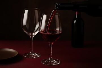 Premium burgundy wine in elegant crystal glass showcasing rich color depth and sophisticated tasting experience for wine connoisseurs