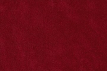 Fototapeta premium Texture of deep red velvet fabric