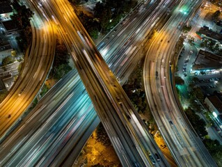 Aerial view of highway interchange at night with light trails in Los Angeles California USA long exposure photography