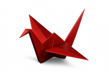 Delicate red paper crane folding wings, symbolizing peace, resting on pristine transparent surface with elegant simplicity