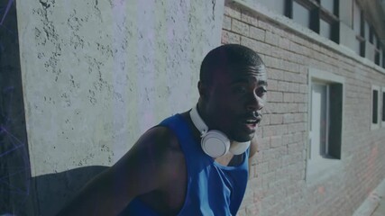 Animation of interference and data processing over resting african american male athlete training - Powered by Adobe