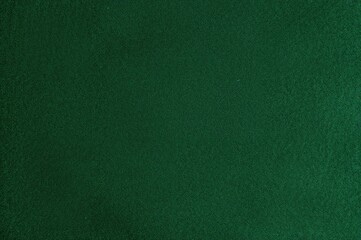 Texture of a lush emerald fabric