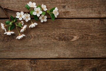 Invitation to a wedding featuring a blooming cherry branch on a rustic wooden surface. A romantic spring-themed backdrop with floral elements, wood texture, paper hearts, and symbols of love.