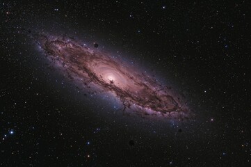 Fototapeta premium Glowing nebula within a galaxy surrounded by dark space and drifting star specks