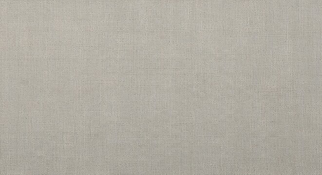 Light beige natural linen fabric texture background. Close-up view of a simple woven textile with a plain pattern, an abstract concept for design and decor