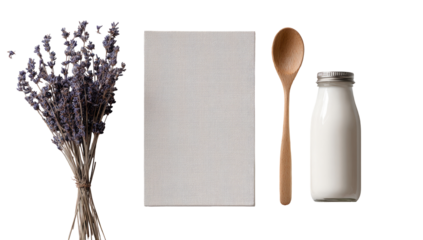 Simple still life featuring lavender, a notepad, wooden spoon, and milk bottle