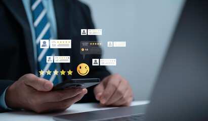Businessman holding smartphone with customer review ratings stars and satisfaction feedback icons. Concept of digital marketing online reputation management consumer trust and brand success