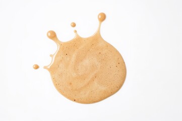 Milk tea or latte spilled on a white surface