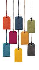 Leather tags in various colors hang from cords