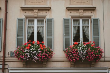 Fototapeta premium Classic residential building adorned with floral window decorations