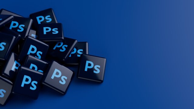 Logo of the software Adobe Photoshop on a pile on blue background with copy space as web banner header