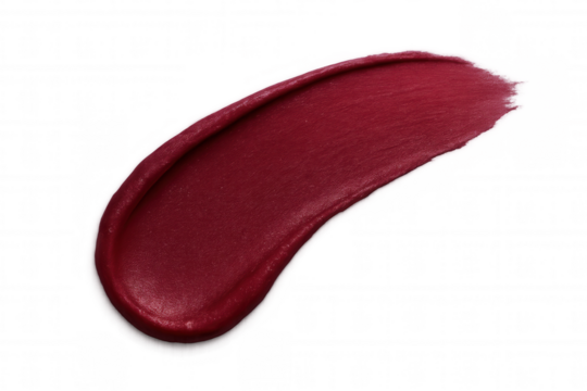 Rich red lipstick sample displaying creamy, glossy texture against transparent backdrop, highlighting cosmetic detail for beauty industry uses
