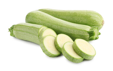 Fresh whole and cut zucchinis isolated on white