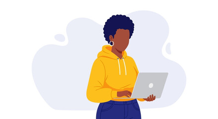 An African American woman in a yellow hoodie uses a laptop, representing remote work, online learning, or digital communication. Ideal for technology, business, or lifestyle content.
