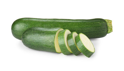 Whole and cut fresh zucchinis isolated on white