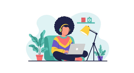 Person with headphones working on a laptop at home, illustrating remote work, online education, or a creative professional lifestyle.