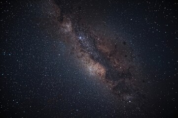 The night sky reveals stars, nebulae, and galaxies, created with AI generative technology