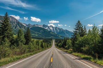 Fototapeta premium Extended view of a scenic mountain terrain featuring a charming roadway